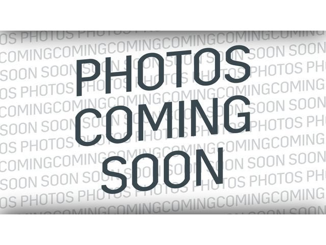 2025 GMC Yukon AT4 Ultimate in Onyx Black — front three-quarter view
