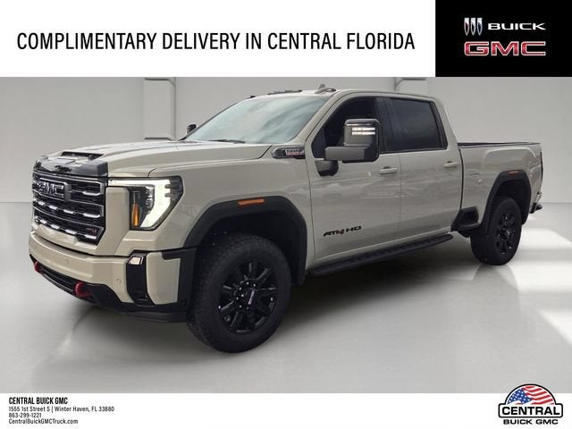 2026 GMC Sierra 2500 HD AT4 in Coastal Dune — front three-quarter view