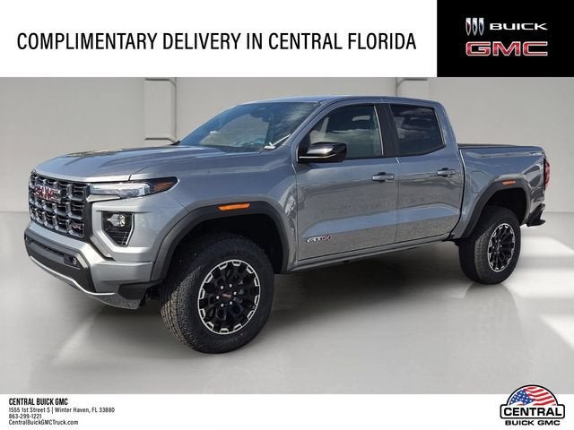 2026 GMC Canyon AT4 in Sterling Metallic — front three-quarter view