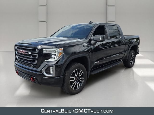2021 GMC Sierra 1500 AT4 in Onyx Black — front three-quarter view