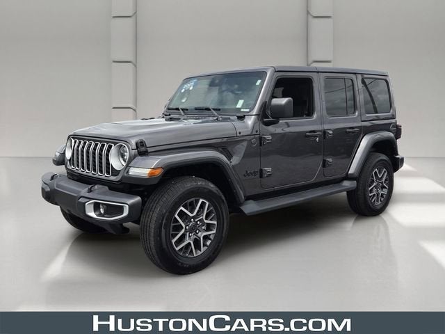 2025 Jeep Wrangler Sahara in Gray — front three-quarter view