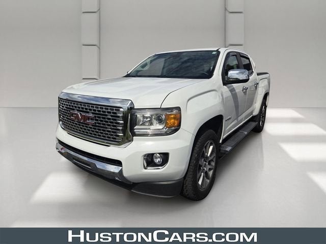 2019 GMC Canyon 4WD Denali in Summit White — front three-quarter view
