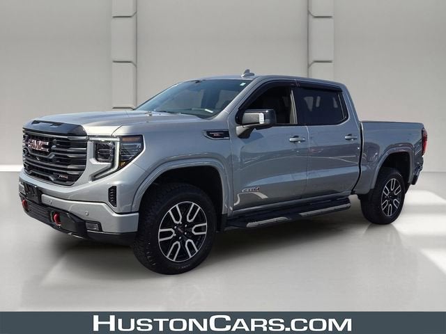 2026 GMC Sierra 1500 AT4 in Sterling Metallic — front three-quarter view