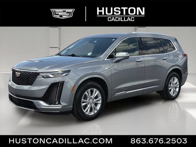 2025 Cadillac XT6 Luxury in Argent Silver Metallic — front three-quarter view