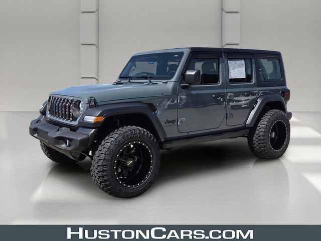 2026 Jeep Wrangler Sport in Gray — front three-quarter view