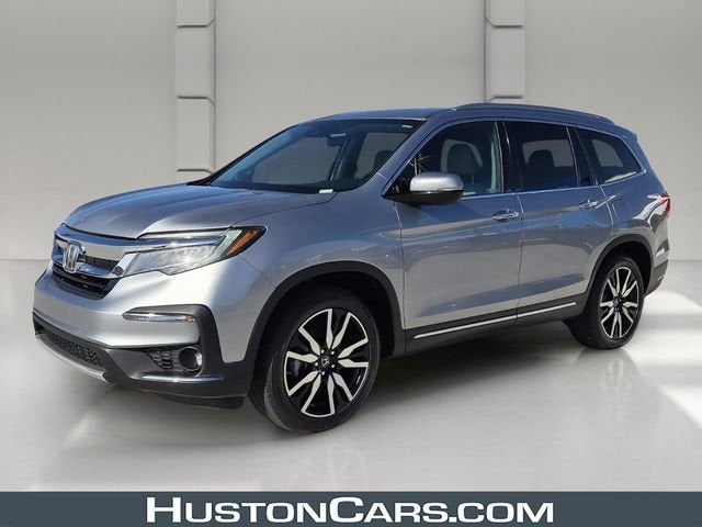 2019 Honda Pilot Touring 8-Passenger in Silver — front three-quarter view