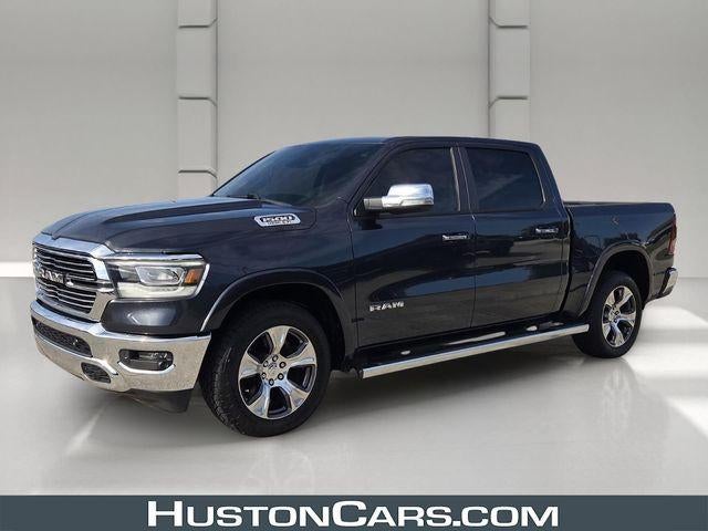 2019 RAM 1500 Laramie 4x4 Crew Cab 5'7" Box in Maximum Steel Metallic Clearcoat — front three-quarter view