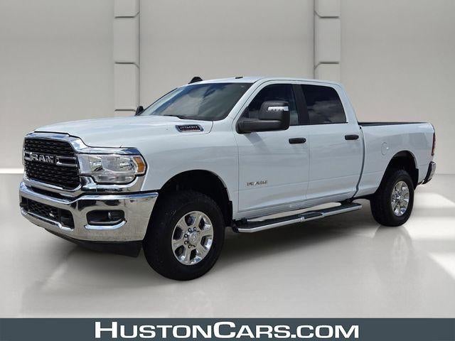 2024 RAM 2500 Big Horn 4x4 Crew Cab 6'4" Box in Bright White Clearcoat — front three-quarter view